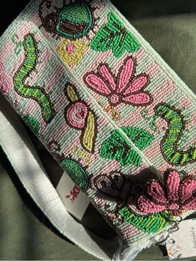 Viral beaded bag bugs caterpillar butterfly Tjmaxx